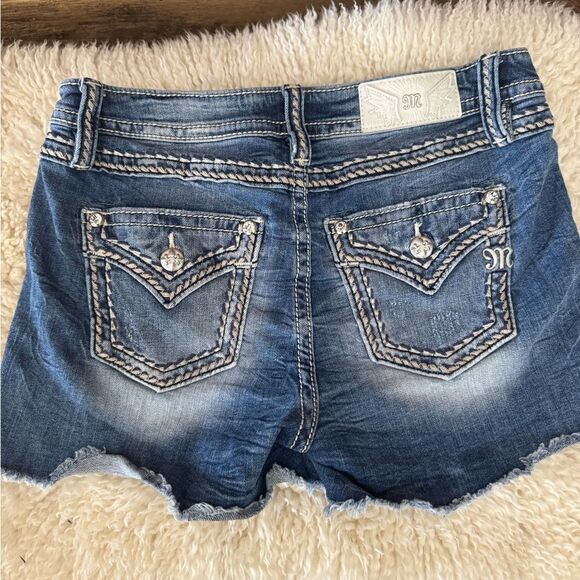Miss Me Blue Jean Shorts with Decorative Stitching and Embellishments - Picture 6 of 7